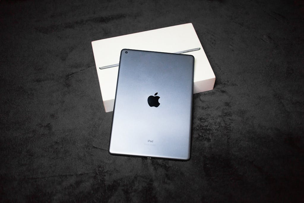 High-quality image of an iPad with a box, perfect for product photography showcasing technology.